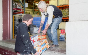 Two men, food donation